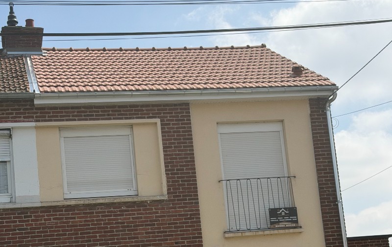 Réfection d'une toiture en Tuiles PV10